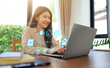 Woman using AI laptop with graphics showing what's possible.