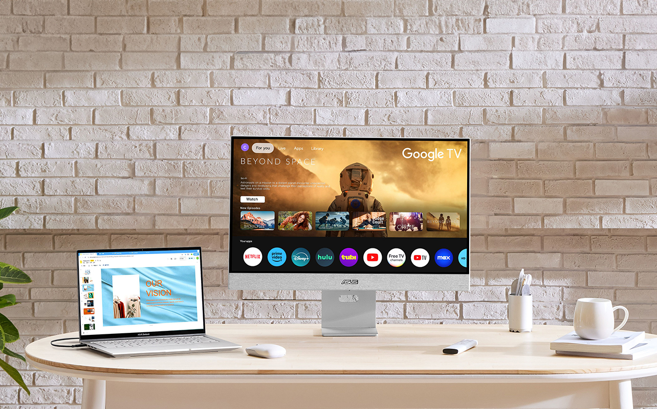 Asus Zenscreen smart monitor on a desk with other devices.