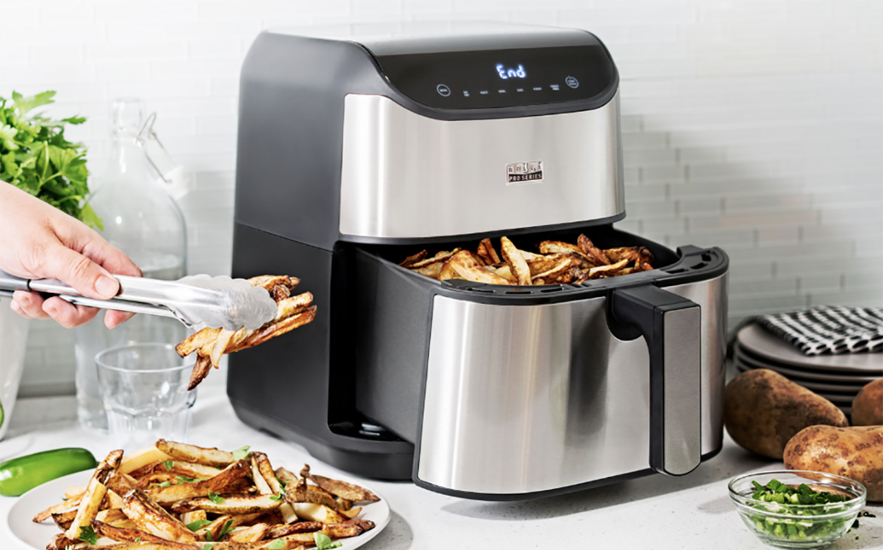 A Bella Pro air fryer with French fries