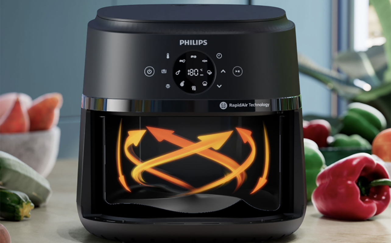 A Philips 2000 series air fryer showing the heat circulating inside.