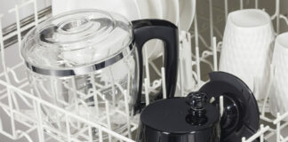 A Hamilton Beach coffee carafe in a dishwasher.