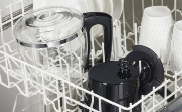 A Hamilton Beach coffee carafe in a dishwasher.