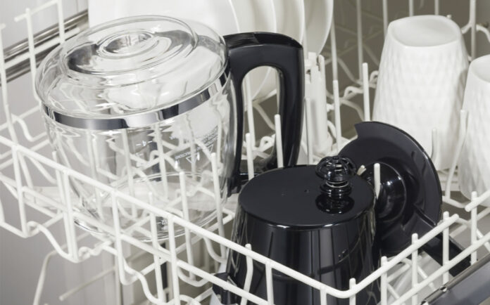 A Hamilton Beach coffee carafe in a dishwasher.