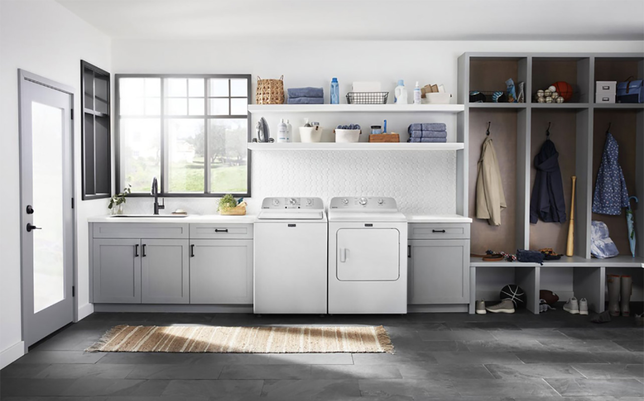A Maytag washer and dryer in a laundry room