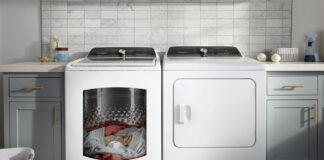 A Whirlpool washer and dryer with clothing in the washer.