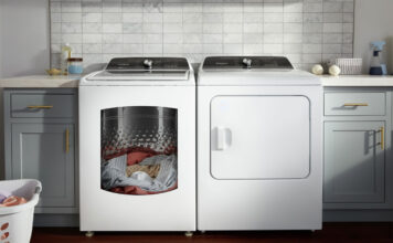 A Whirlpool washer and dryer with clothing in the washer.