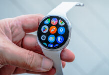 Samsung Galaxy Watch8 loose in hand showing app screen.