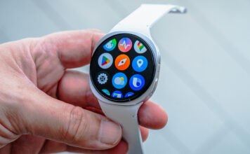 Samsung Galaxy Watch8 loose in hand showing app screen.