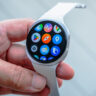 Samsung Galaxy Watch8 loose in hand showing app screen.
