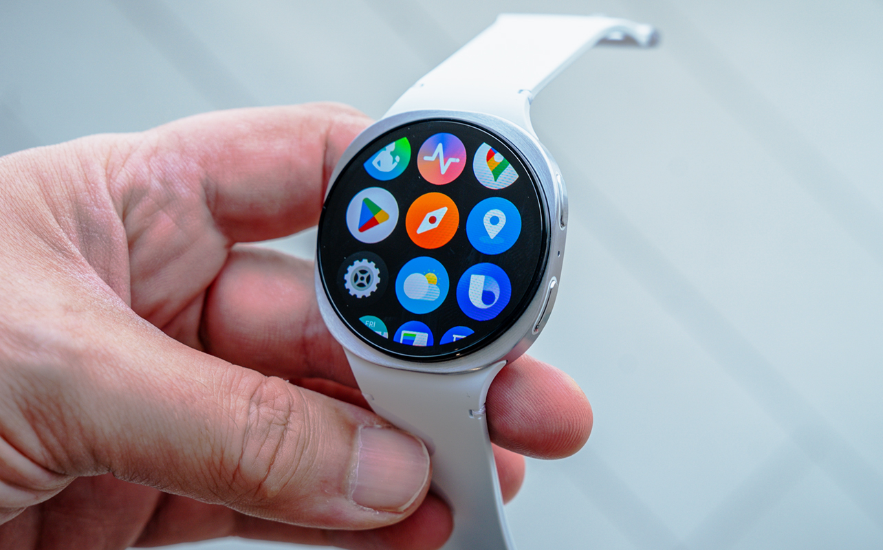 Samsung Galaxy Watch8 loose in hand showing app screen.