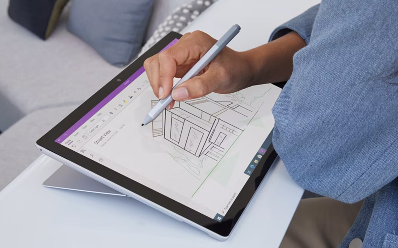 Person drawing something on a Microsoft Surface with Surface Pen.