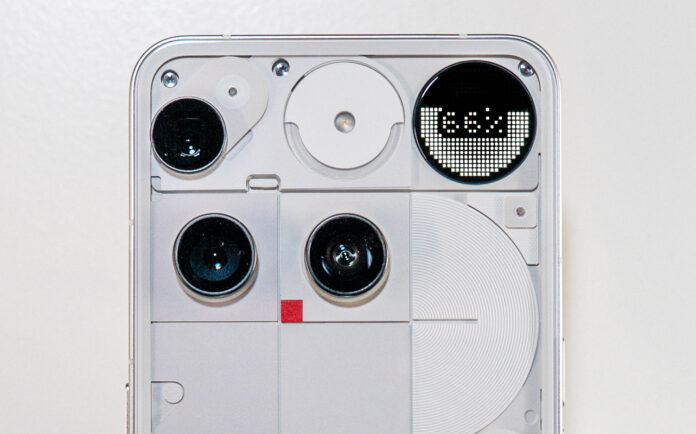 View of top half of back of Nothing Phone (3) in white.