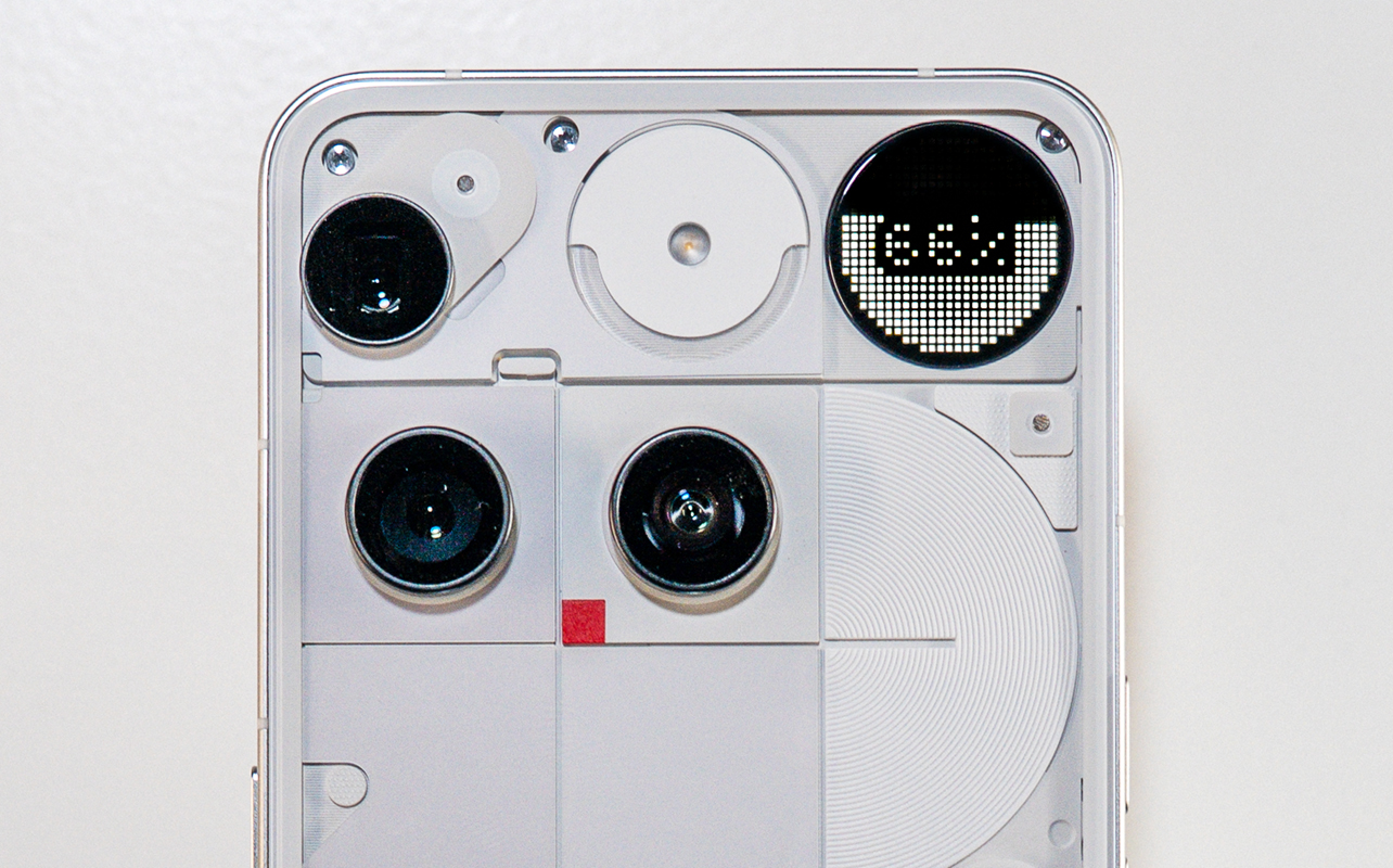 View of top half of back of Nothing Phone (3) in white.