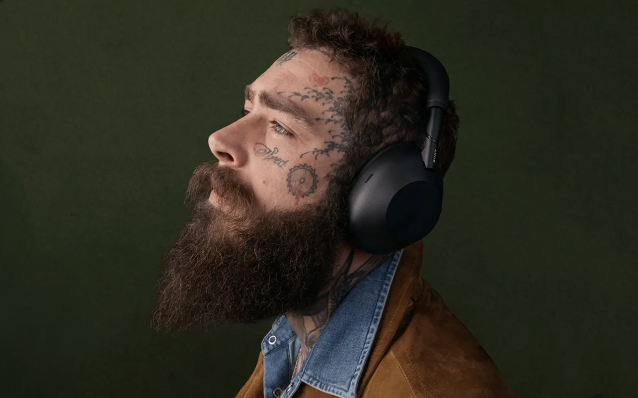 Musician Post Malone wearing Sony WH-1000XM6 ANC headphones.