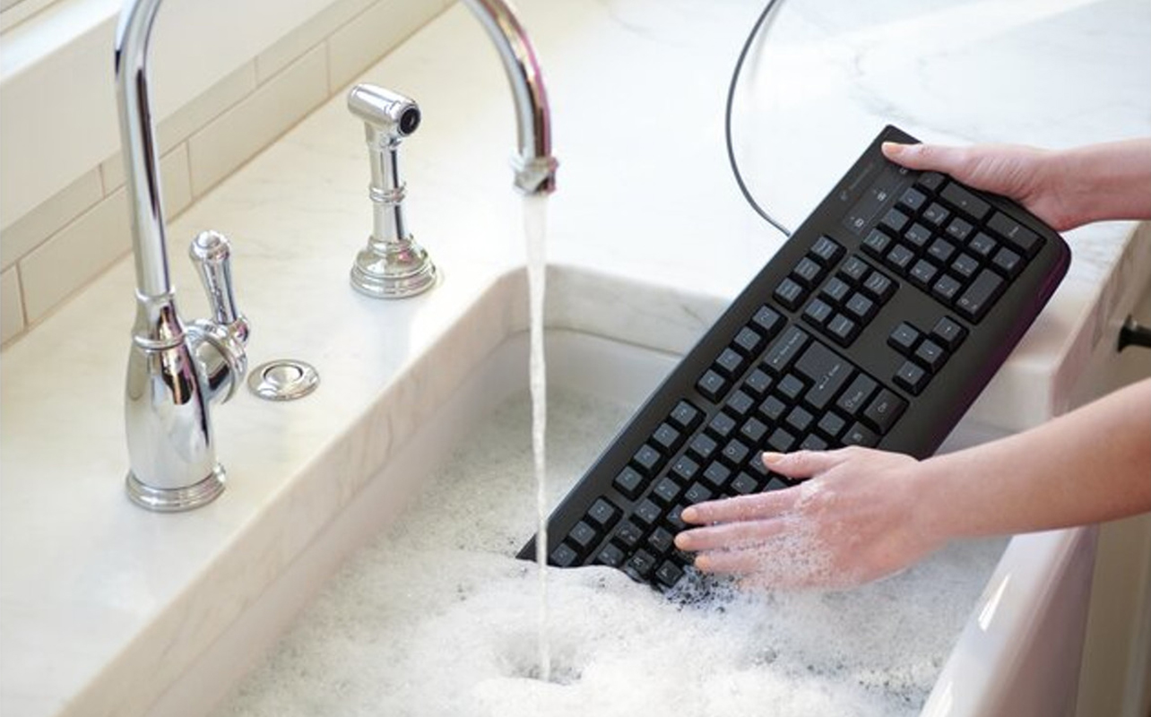 Kensington Pro Fit USB Washable Keyboard washed in a sink.
