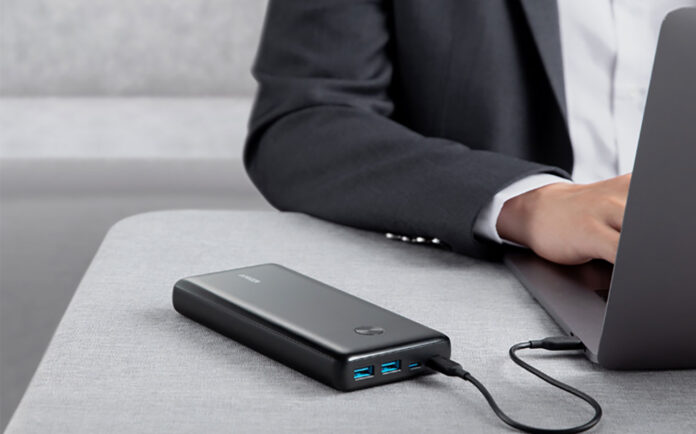 A close up of the Anker Powercore III Elite charging a laptop