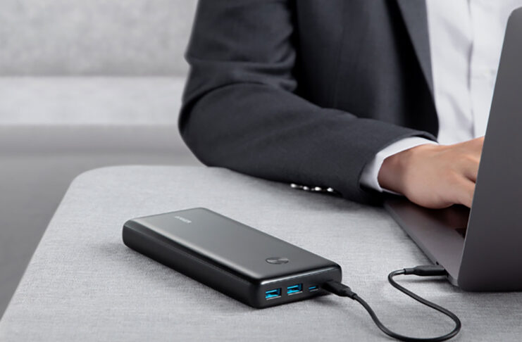 A close up of the Anker Powercore III Elite charging a laptop