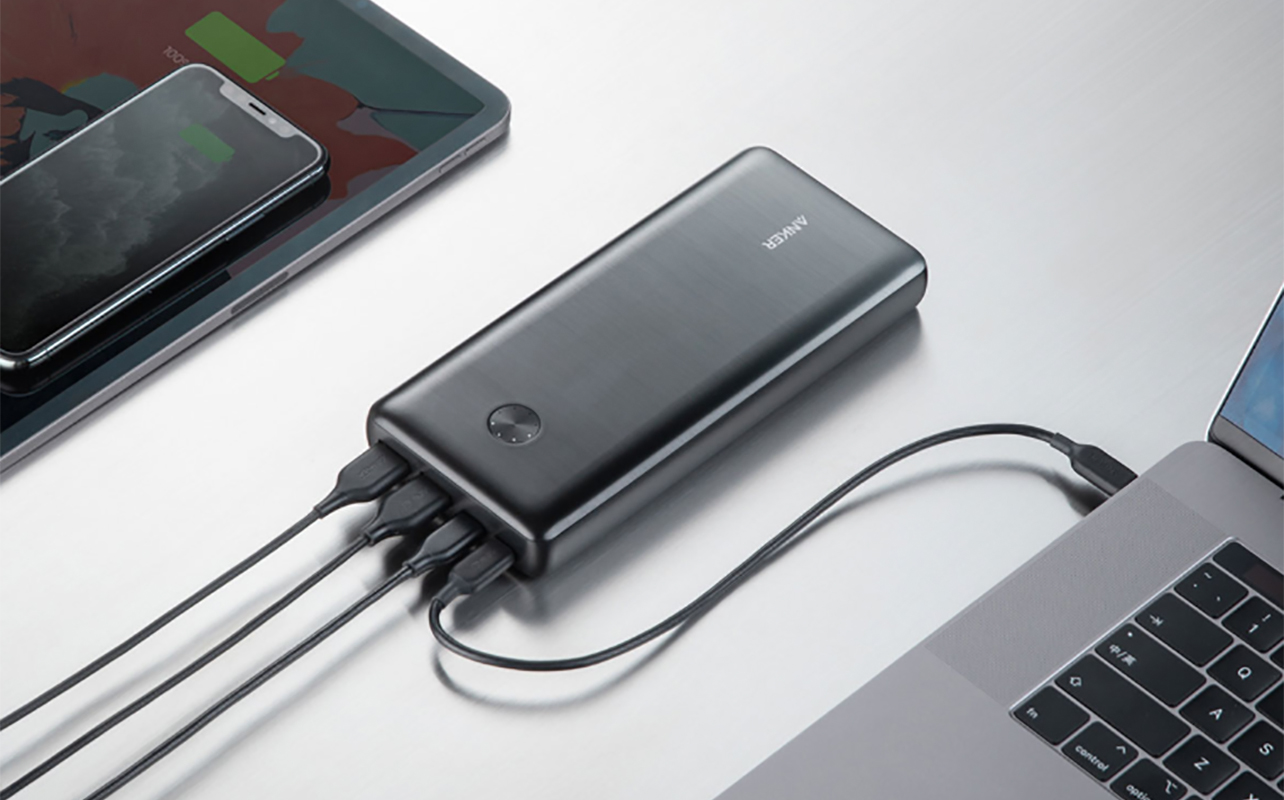 Anker PowerCore III Elite charging a laptop and other devices.