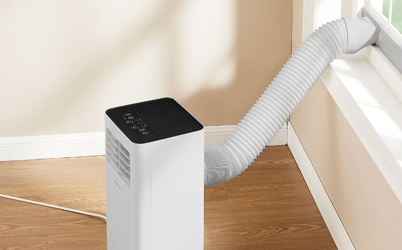 Insignia portable AC with the hose mounted on the window - Leaking Air Conditioner