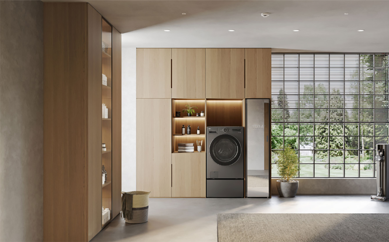 An LG washer dryer combo unit in a living room.