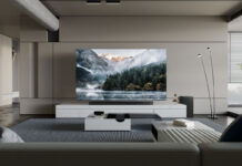 A Samsung Neo QLED TV on furniture in a room.