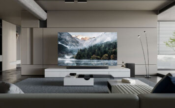 A Samsung Neo QLED TV on furniture in a room.