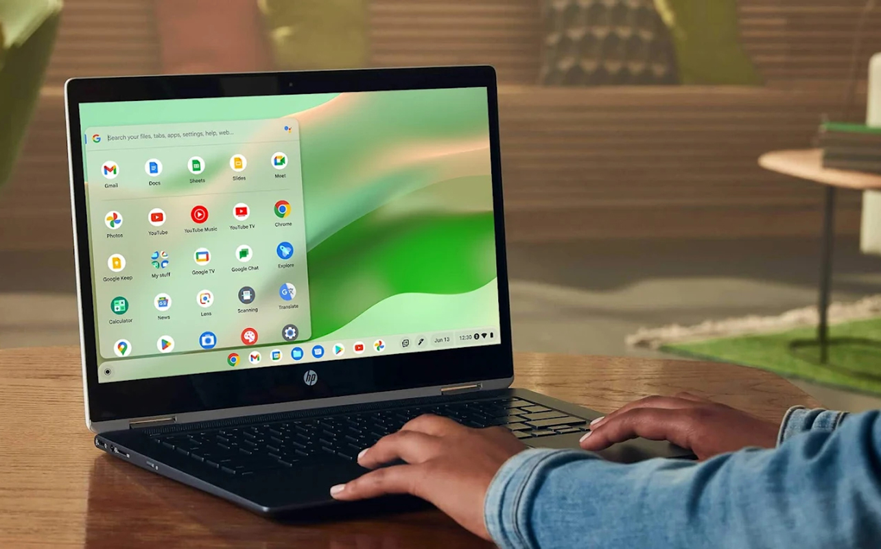 HP Chromebook open showing home screen with app tray open.
