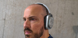 Wearing Nothing Headphone (1) indoors.