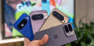 Google Pixel 10 series phones in hand fanned out.