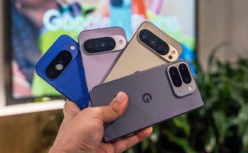 Google Pixel 10 series phones in hand fanned out.
