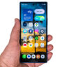 Samsung Galaxy Z Fold7 folded in hand on white background.