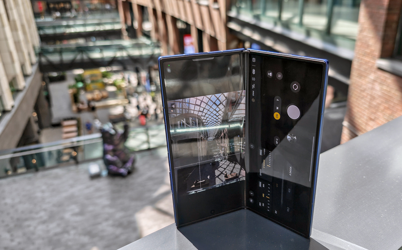 Samsung Galaxy Z Fold7 propped up to take a photo off a ledge.