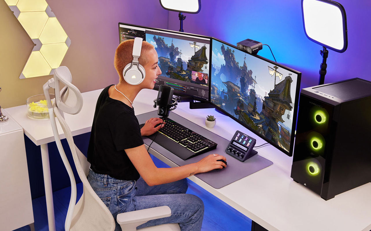 Person using Stream Deck at a dual-monitor setup