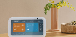 An Amazon Echo Show 5 on a side table showing smart home controls.