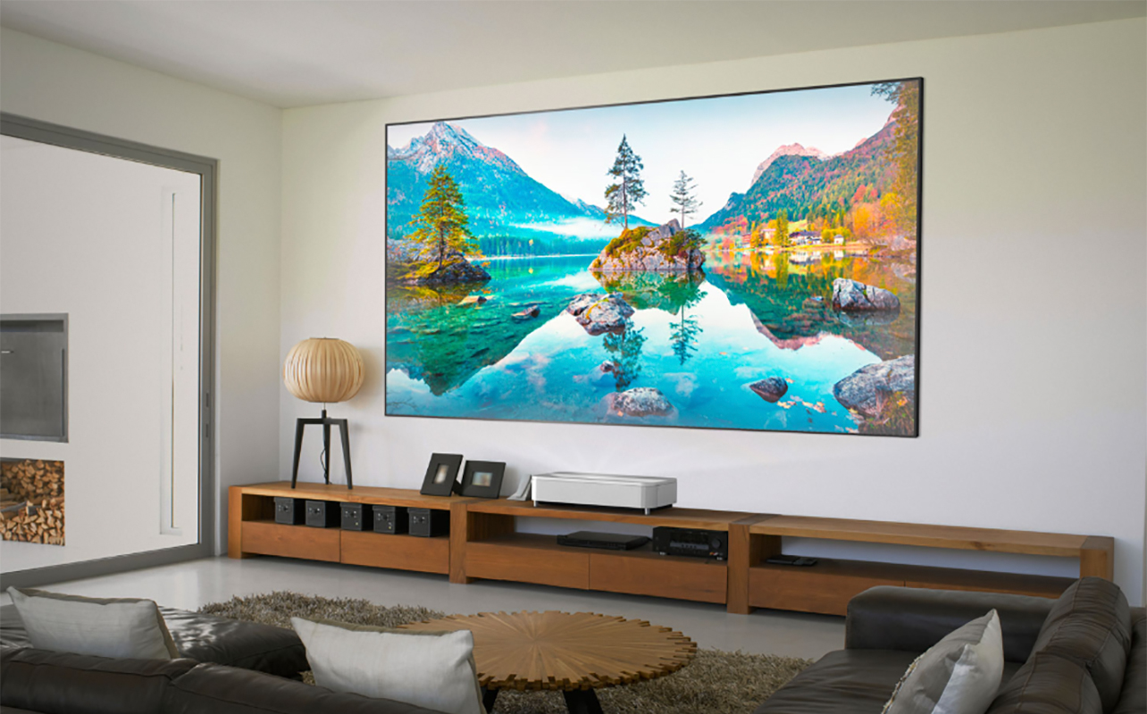A living room with the Epson EpiqVision LS800 ultra short throw projector.