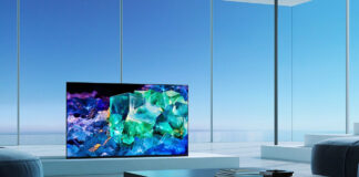 A QD OLED TV in a room with windows.