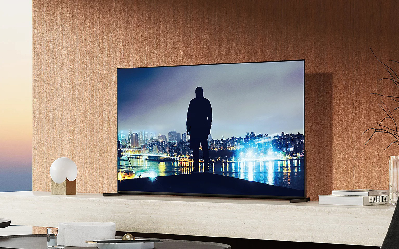 A Sony Bravia 8 II QD-OLED TV mounted on a stand.