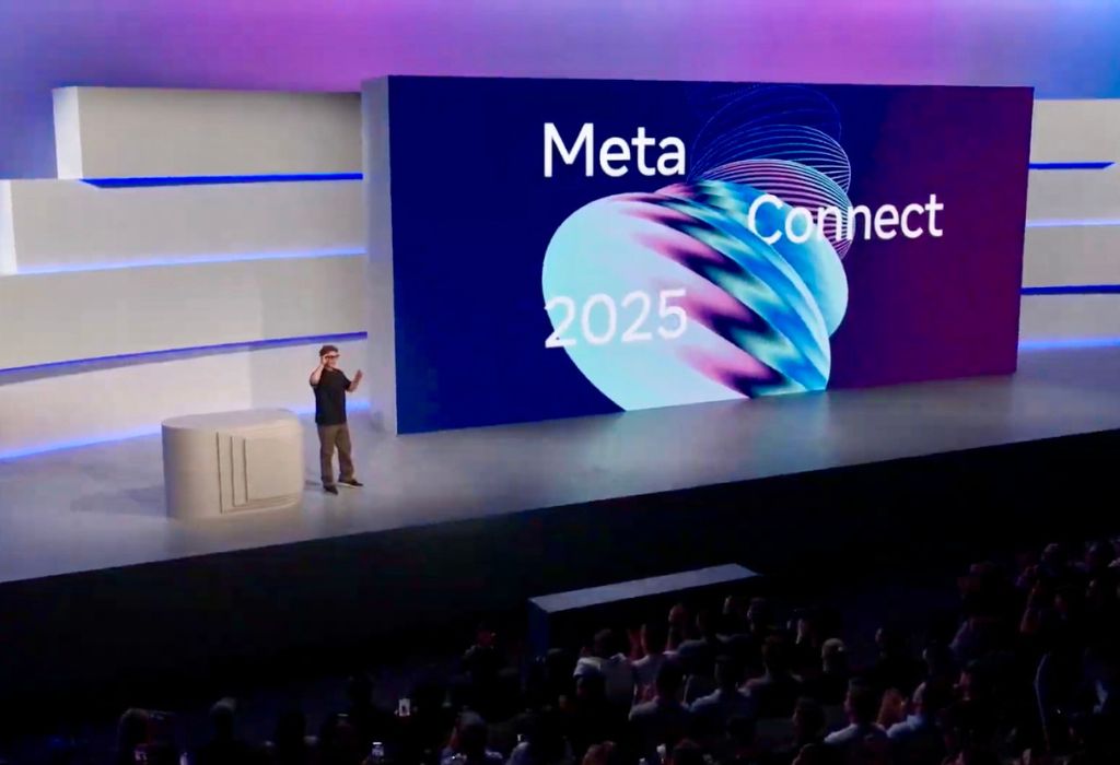 A stage with the words Meta Connect 2025 with a person on it.