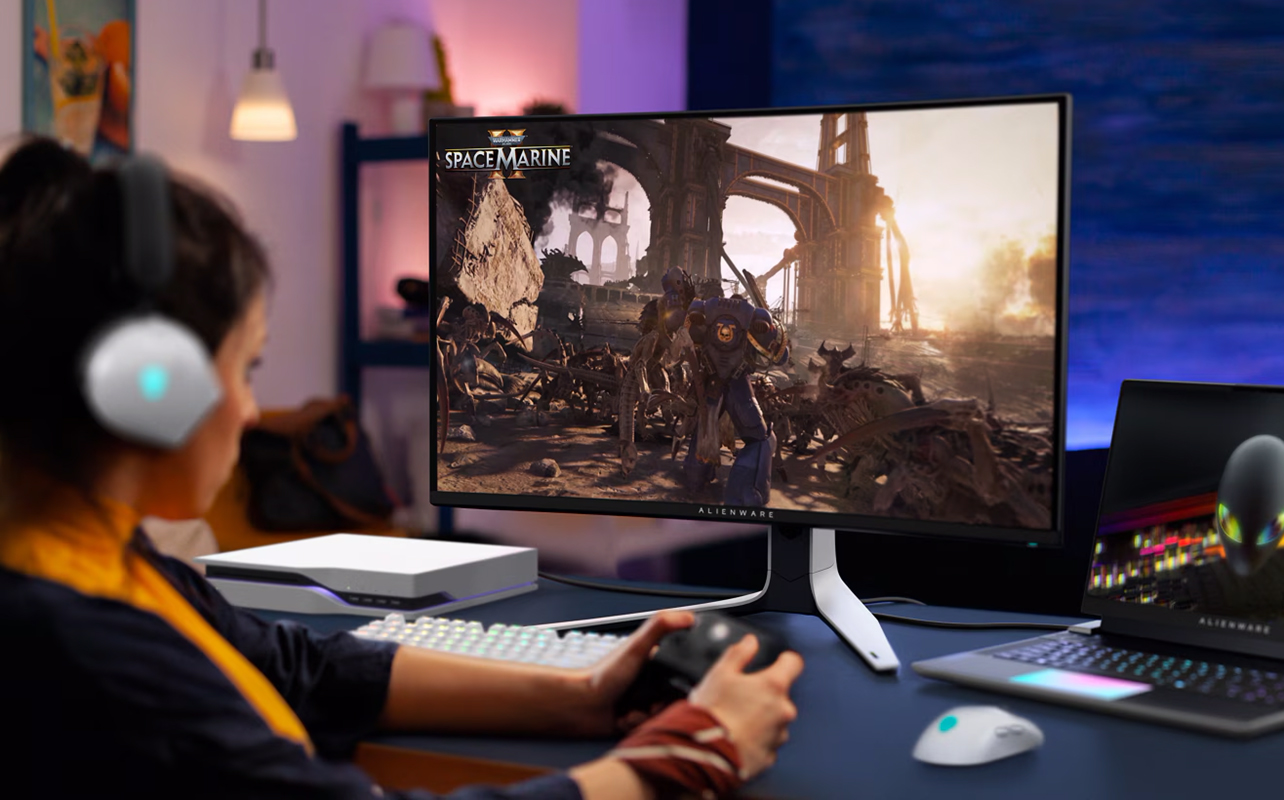 Woman playing a console game on a curved monitor.