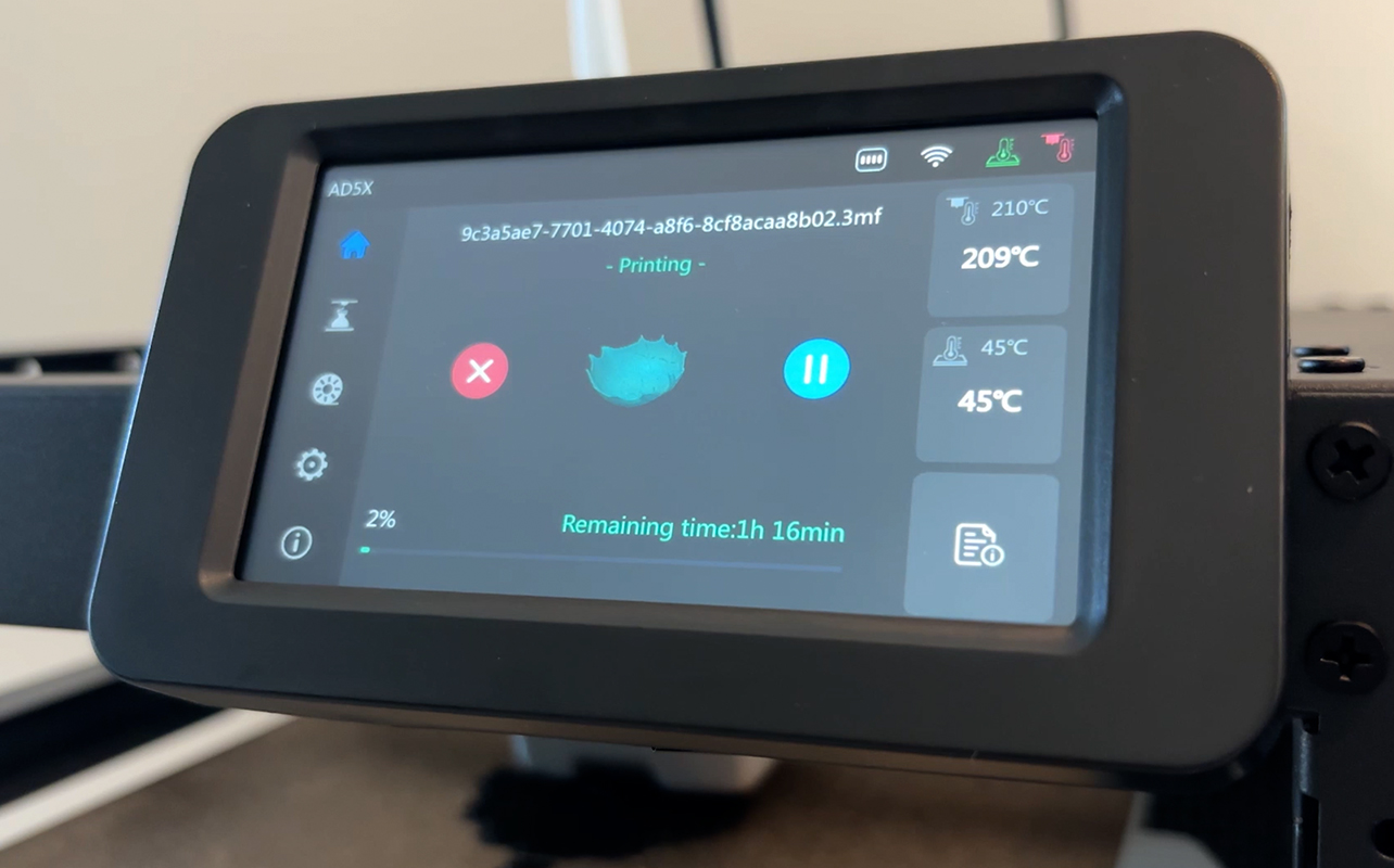 AD5X touchscreen showing print progress