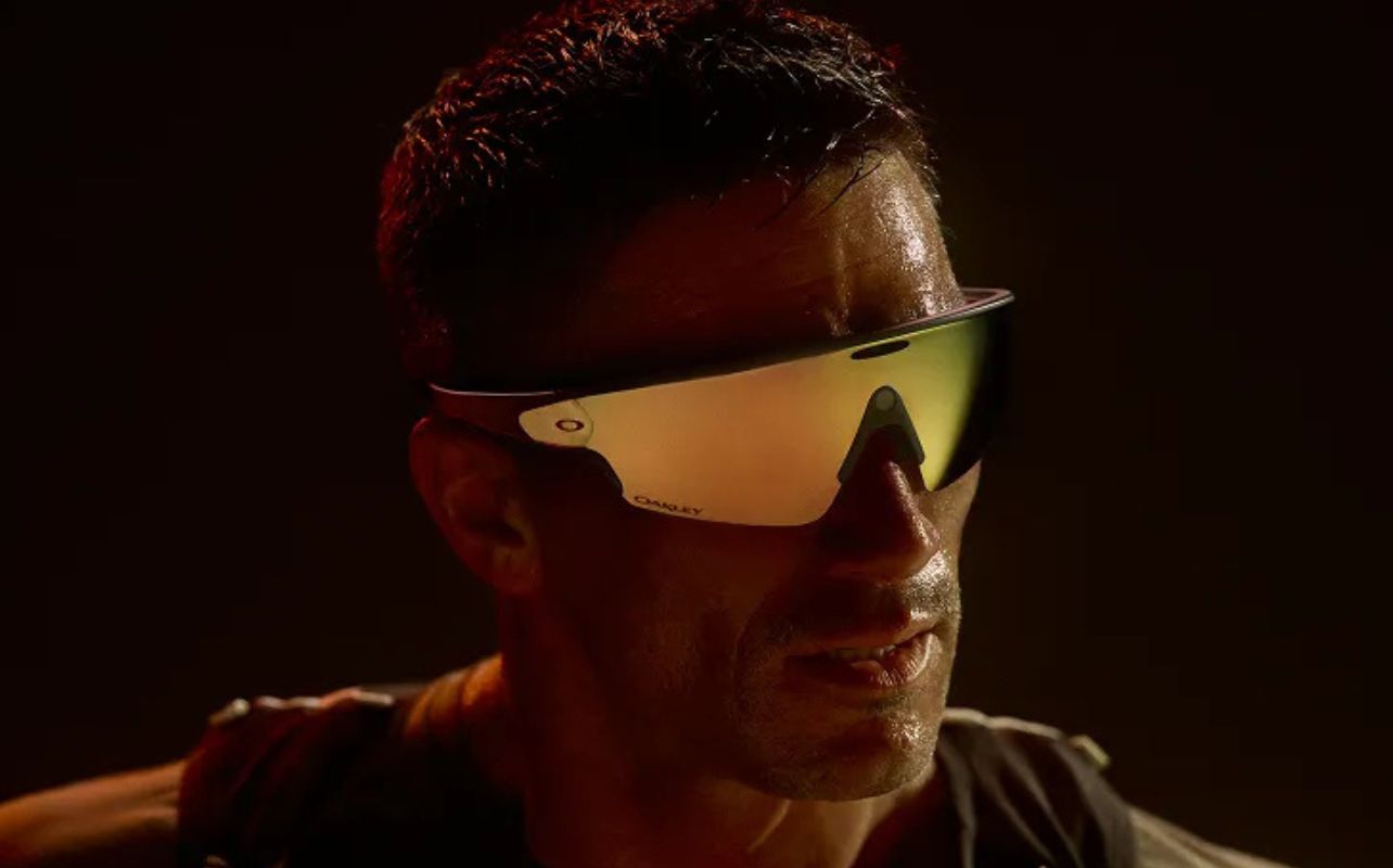 A man with a black background wears the new Oakley Meta Vanguard sunglasses.