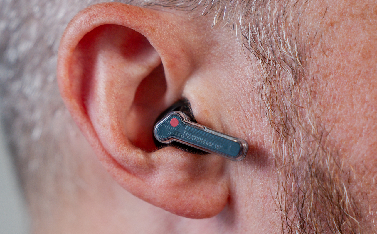 Close-up view of Nothing Ear (a) earbud in left ear.