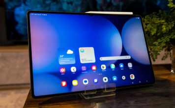 Samsung Galaxy Tab S11 Ultra sitting upright on a coffee table.