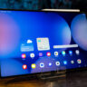 Samsung Galaxy Tab S11 Ultra sitting upright on a coffee table.