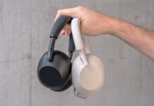 Holding the Sony WH-1000XM6 and XM5 in hand.