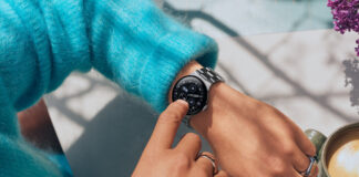 A Google Pixel Watch 4 o a wrist.
