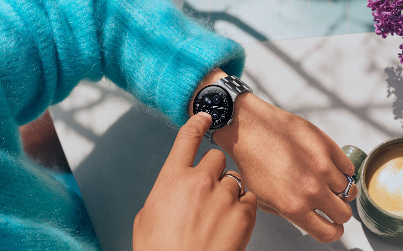 A Google Pixel Watch 4 o a wrist.