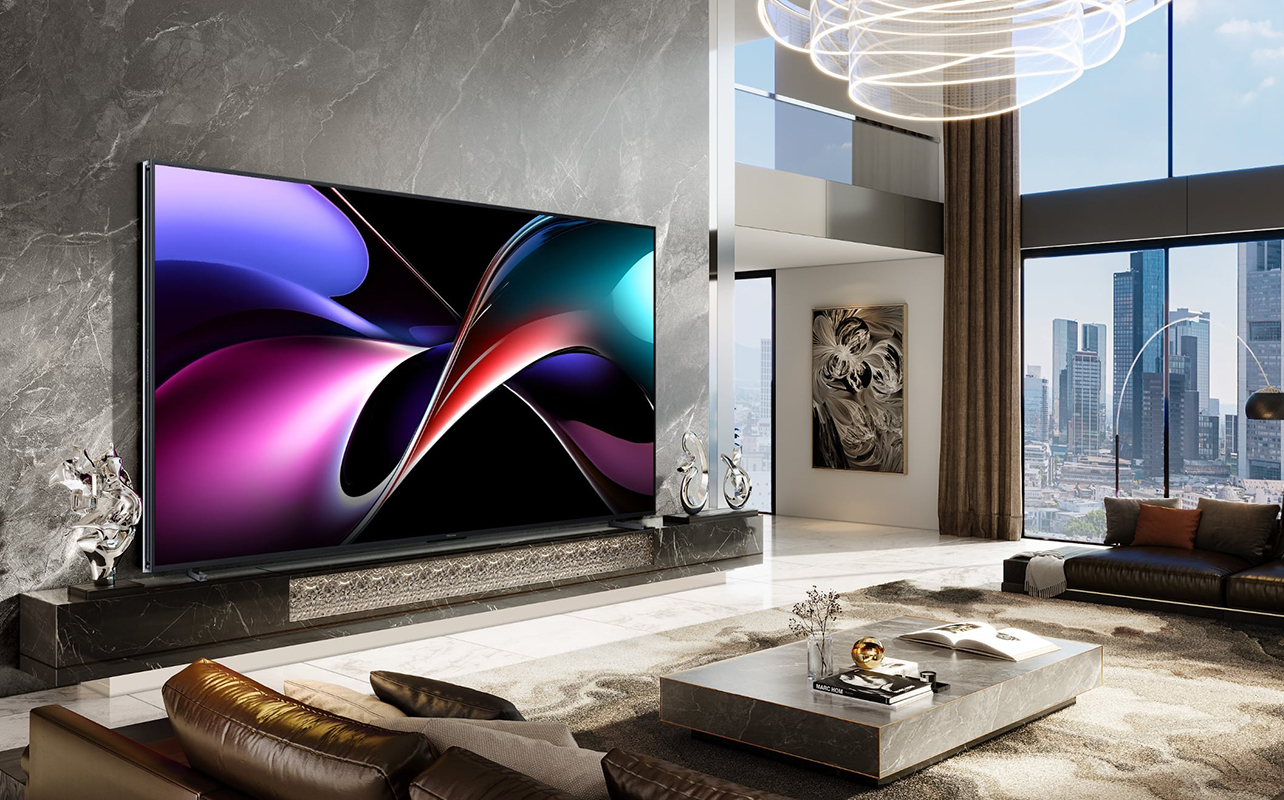 The Hisense 166UX on a wall in a living room.