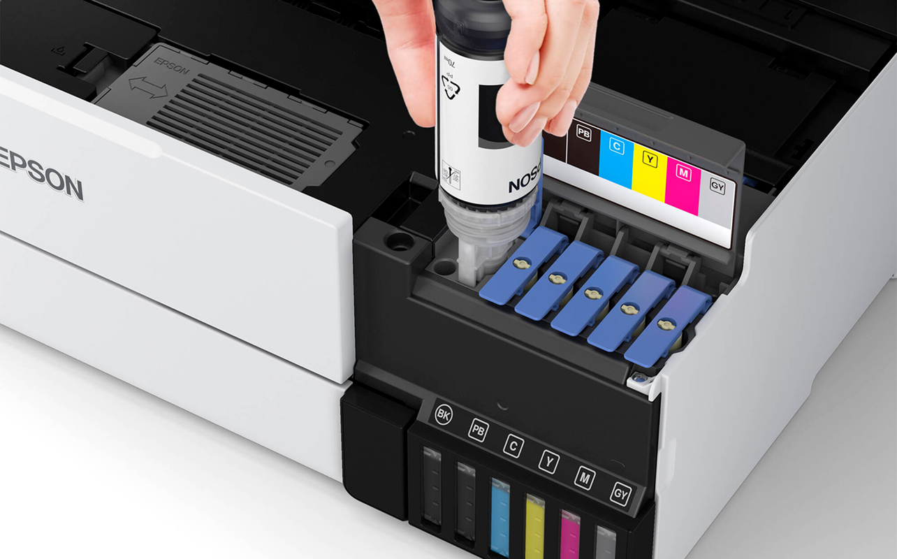inkjet vs laser printer - filling up Epson ink tank printer.