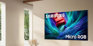 A Samsung RGB TV on a wall in a living room.